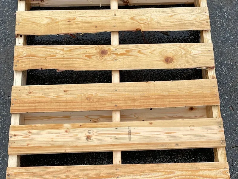 New heat-treated wood pallet with HT stamp