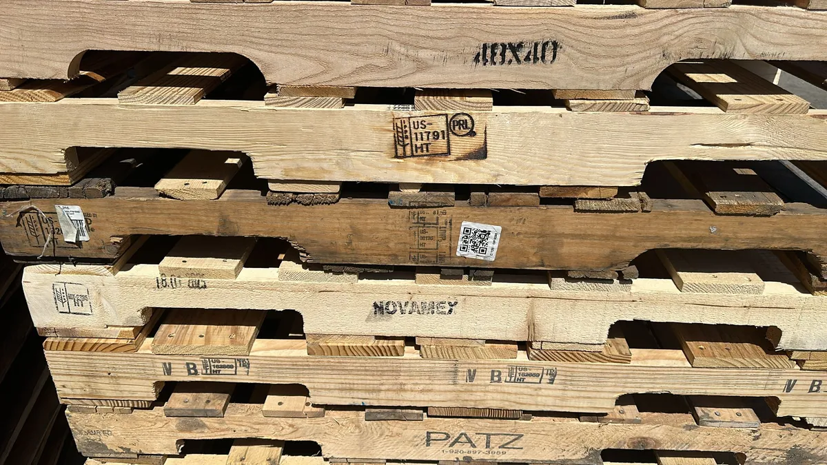ISPM-15 HT heat-treatment stamps on wood pallets