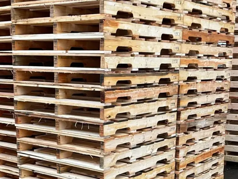 Stacks of new 48 x 40 wood pallets