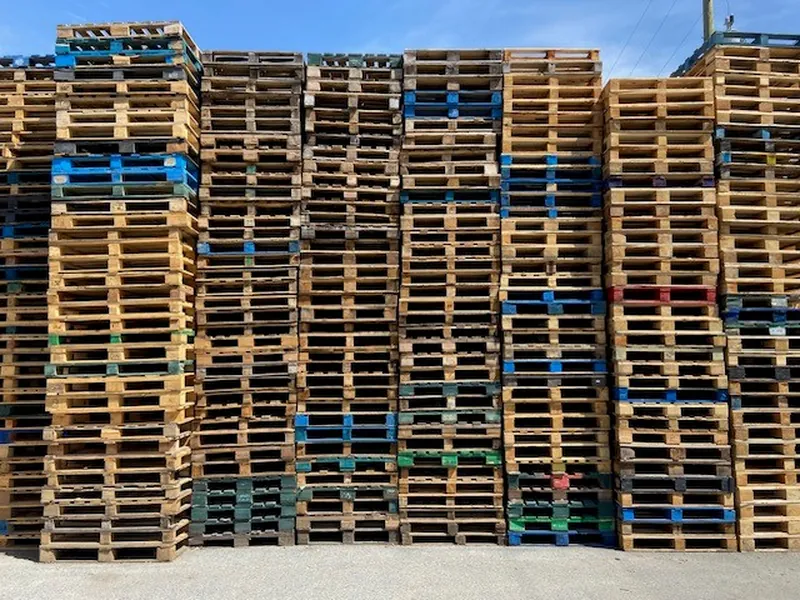 Mixed used pallets collected for recycling